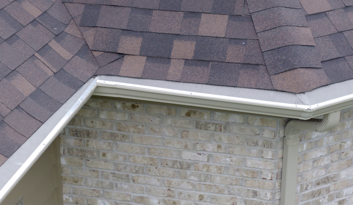 House roof and seamless gutter systems.